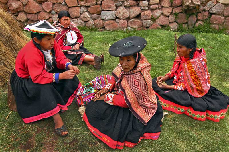 Indigenous Quechua Women at Awana Kancha Weavers in the Sacred Valley of Peru Create Hand-loomed Products