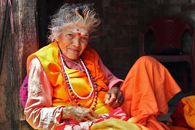 Woman in Sadhu Clothes at Old Folks Home at Pashupatinath Temple in Kathmandu, Nepal