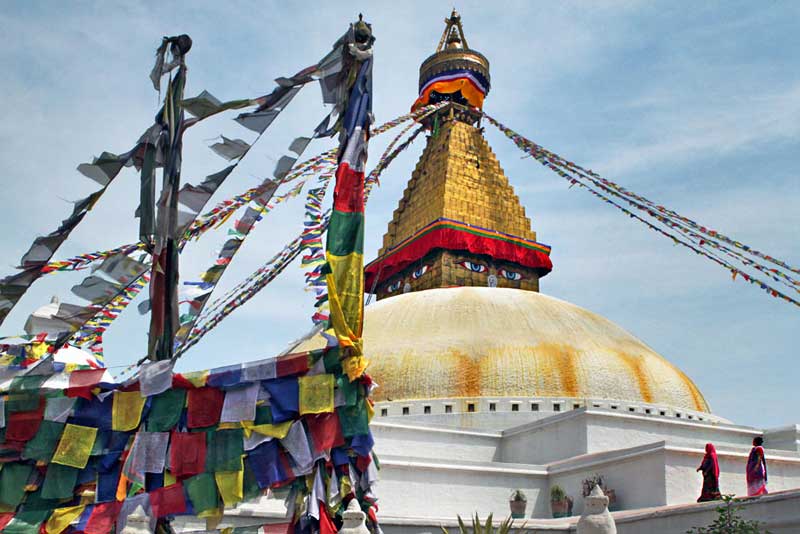 Prayer Flags and All-seeing Eyes at Boudhanath Buddhist Temple in Kathmandu, Nepal