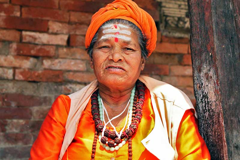 Old Woman Strikes a Pose at the Pashupatinath Temple in Kathmandu, Nepal