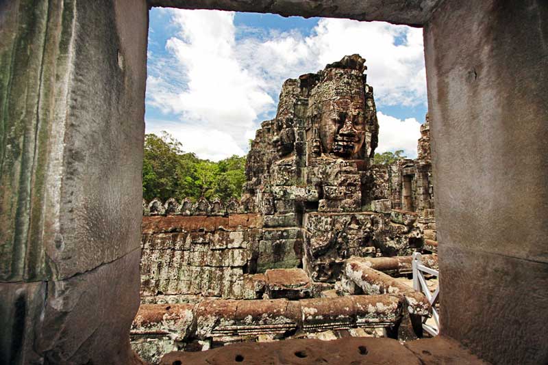 Buddha Head Through a Window at Bayon Ruins, Angkor Wat, Cambodia