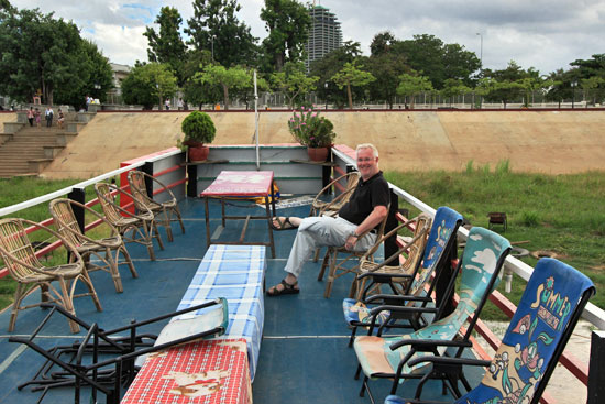 Larry relaxes on the upper deck as we pull away from the shore on our sunset cruise