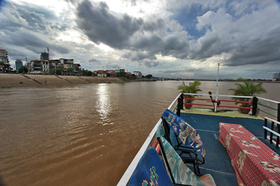 Cruising the Tonle Sap River in Phnom Penh on an overcast day