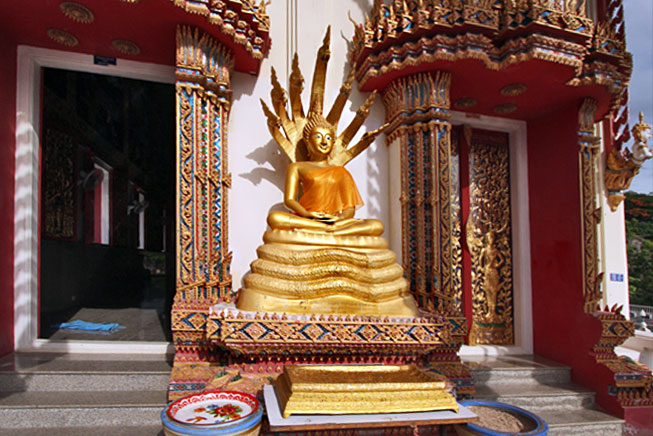 Buddha Graces the entry door at a Theravadan Buddhist Temple near the south end of Hua Hin