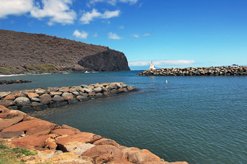 Manele Bay Harbor on Lanai, Hawaii, is Flanked by Soaring Lava Cliffs