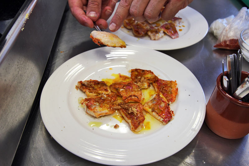 Sauteed Red Mullet with Coconut, Pineapple, and Olive Oil, an Appetizer Prepared in our Cooking Class in Girona, Spain