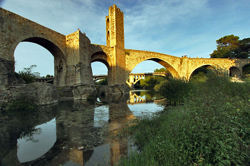 Medieval Stone Bridge in Besalu, Spain Turns Golden in Setting Sun