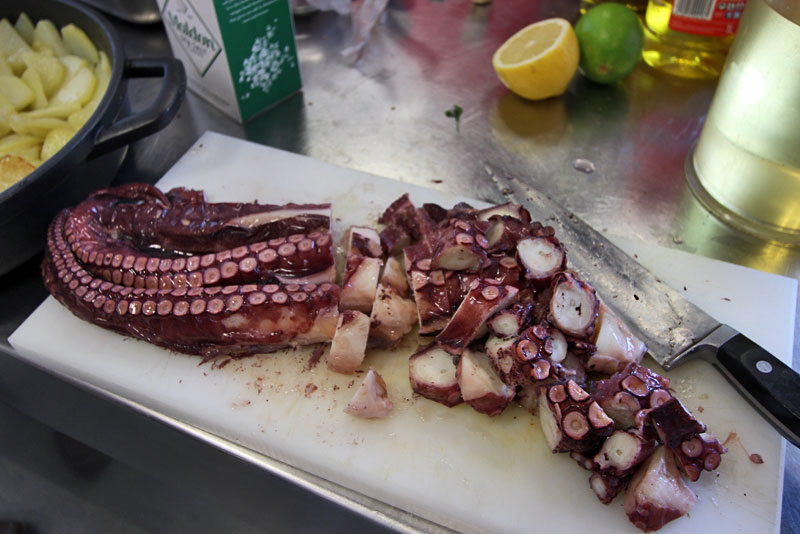 Chopping up Fresh Octopus in Our Cooking Class in Girona, Spain