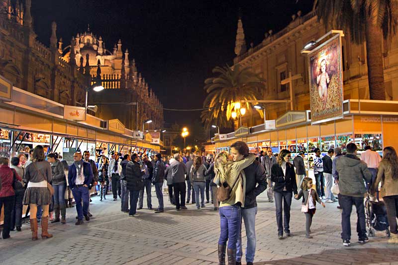 Shoppers at Christmas Market in Seville, Spain Buy Items for Nativity Scenes, Decorations, Breads and Cakes