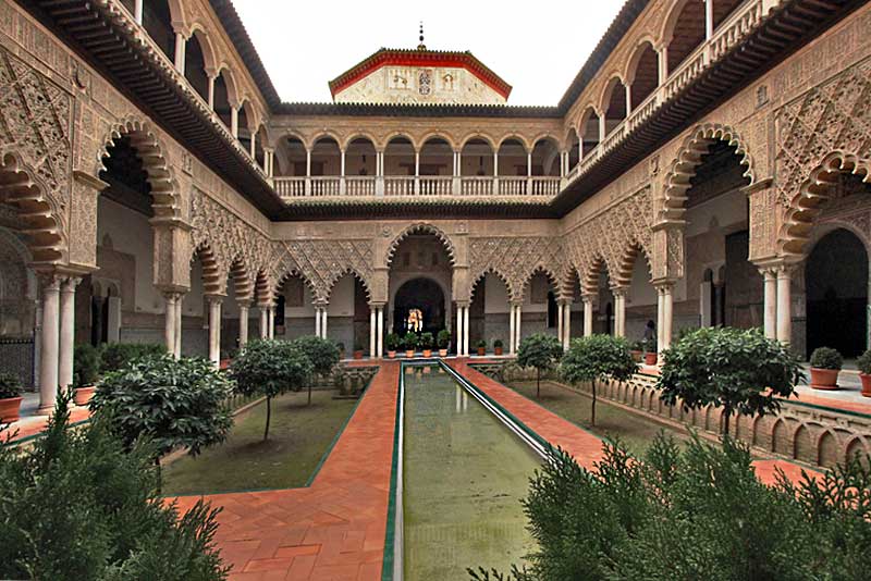 Plaster Patio at Royal Alcazar in Seville, Spain Features Ornate Sculptures, Gardens and Streams Designed in 12th Century Moorish Architectural Style