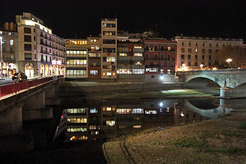 Lights Reflect on the Onyar River on a Winter Night in Girona, Spain