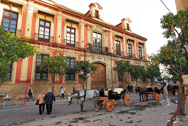 Horse-drawn Carriages in Plaza Virgen de los Reyes in Seville, Spain