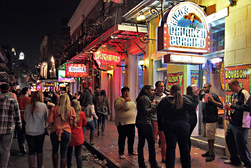Revelers on Bourbon Street in the French Quarter of New Orleans