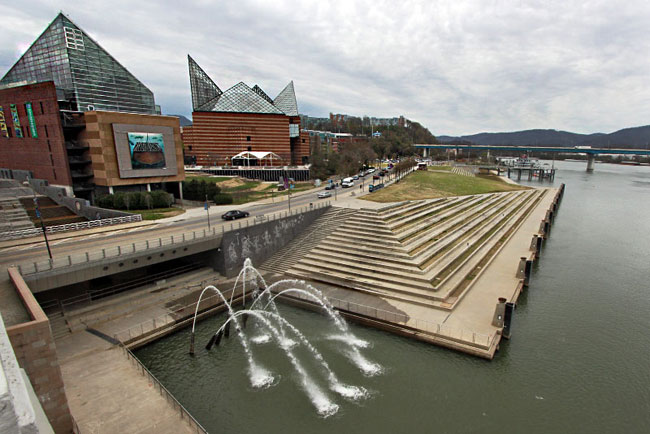 Chattanooga's Riverfront, with Tennessee Aquarium and seven fountains at the base of The Passage, America’s largest public art project celebrating Cherokee history and commemorating the Trail of Tears