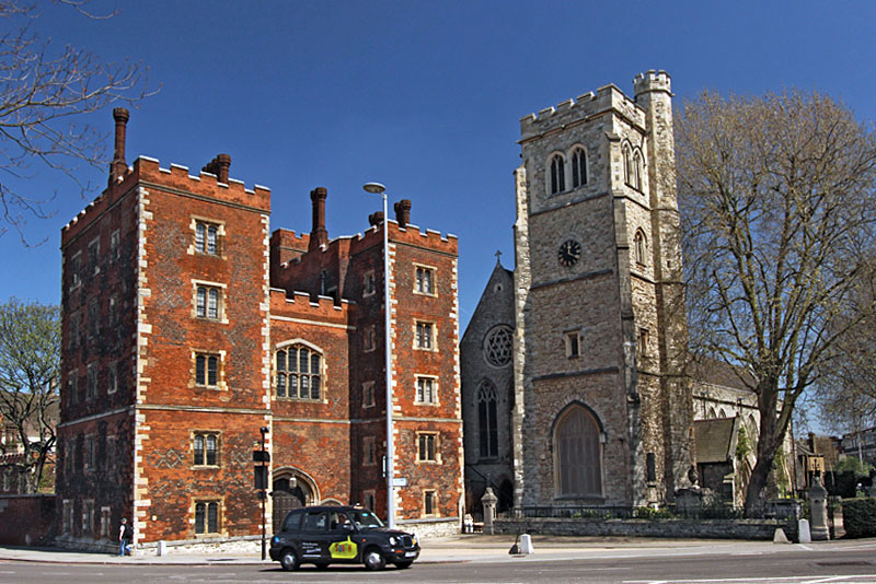 Lambeth Palace (left), Residence of England's Archbishop of Canterbury, and St. Mary at Lambeth Church (right), in London
