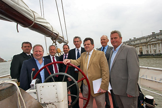 Officials on board the Tall Ship Lady Avenel sign the official contract to bring the Tall Ships Regatta back to the Royal Borough of Greenwich in 2014