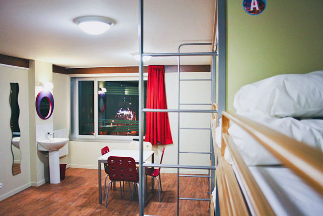 Dorm bunks have privacy curtains, individual lights, electrical socket, and a large locker for securing personal items. Photo courtesy of St. Christopher's Inns Canal, Paris