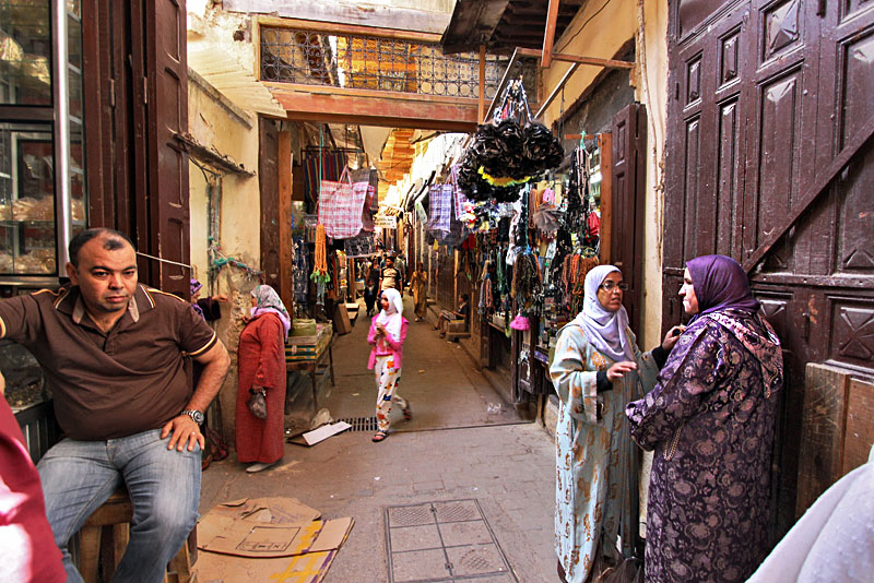 Local Women Share Shopping and Gossip in the Medina (Old City) in Fez, Morocco