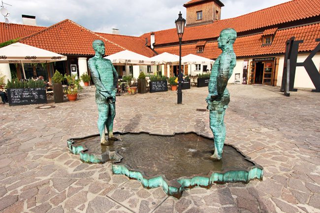 "Peeing" - David Cerny's sculpture at the Franz Kafka Museum shows two males urinating into a Czech-shaped pool