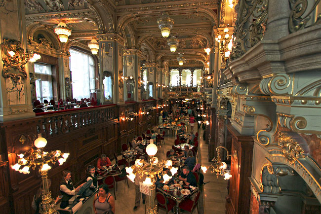 Opulent Italian Renaissance and Baroque decor at New York Cafe, one of Budapest's most famous coffee houses