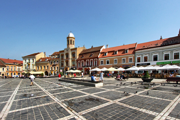Piata Sfatului, the main square in Old Town in Brasov, Romania, is dirty and sadly neglected