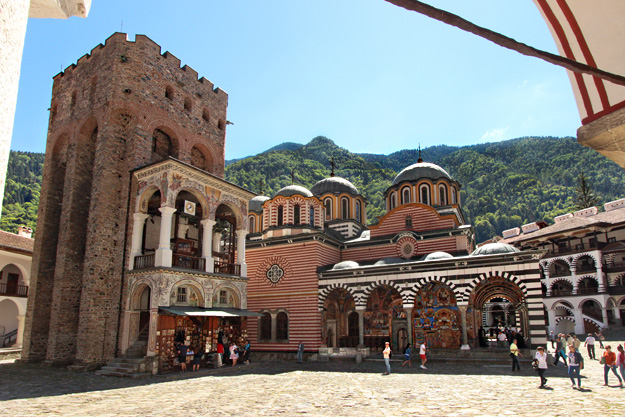 Hrelyu Tower (left), built between the 13th and 14th centuries by prince Hrelyu Dragovol, and The Nativity of the Virgin church (right) at Rila Monastery