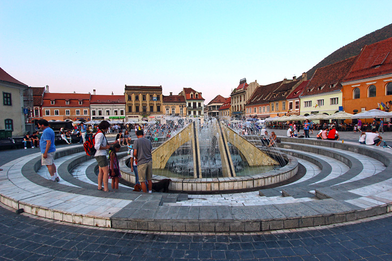 Fountain in Piata Sfatului Square in the Old Town of Brasov, Romania