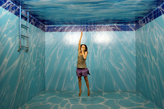 Paola takes a dive in the pool at Art in Paradise in Chiang Mai, Thailand