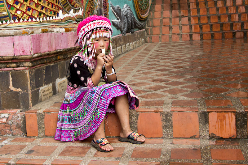 Hill Tribe Girl Wearing Traditional Costume at Doi Suthep Temple in Chiang Mai, Thailand