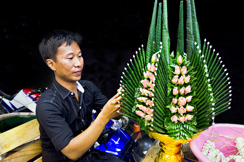 Rosebuds and Banana Leaves are Used to Create Traditional Thai Floral Arrangement in Chiang Mai