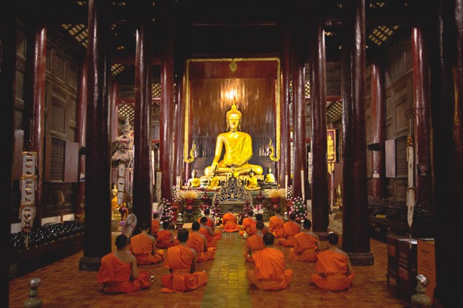 Monks chant at Wat Phan Tao in Chiang Mai, Thailand
