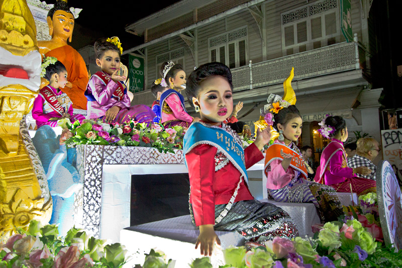 Thai Girls Wave from Festival Float in the Yi Peng Parade in Chiang Mai, Thailand