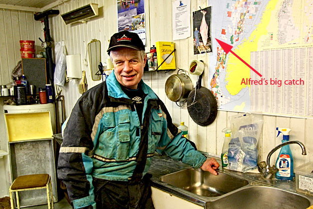 Alfred proudly shows me the newspaper clipping with a photo of the monster fish he caught