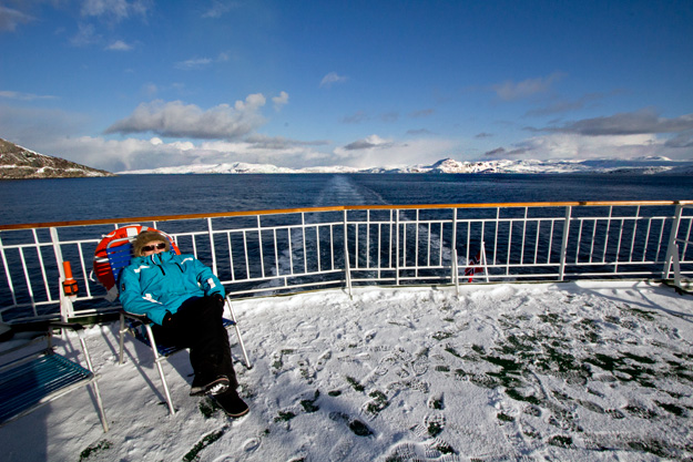 A little snow didn't deter this passenger from catching a few rays on the top deck
