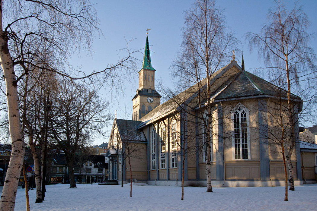 Old Wooden Cathedral in the center of Tromso, Norway, on a sunny but cold afternoon