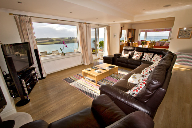 One half of the double living room at Stargazers, one of the holiday home rentals available from St. Mawes Retreats in Cornwall