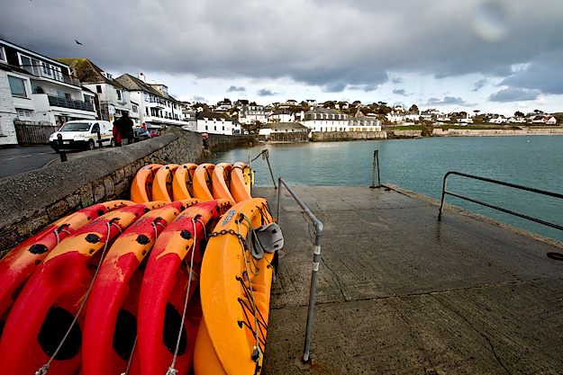 Strolling along the waterfront in St. Mawes, Cornwall, England