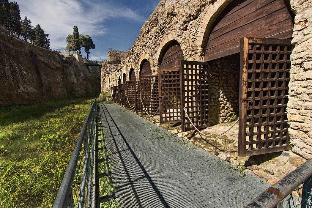 Three hundred skeletons discovered in 1980 still lie inside the Boat House at Herculaneum, where they had fled the eruption of Mt. Vesuvius