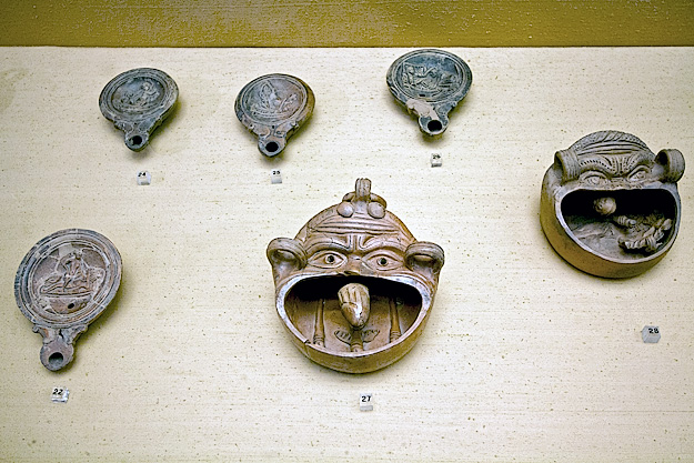 The use of these small terracotta trays is still unknown, though some speculate that they were filled with water, allowing the moveable penis to float and bob