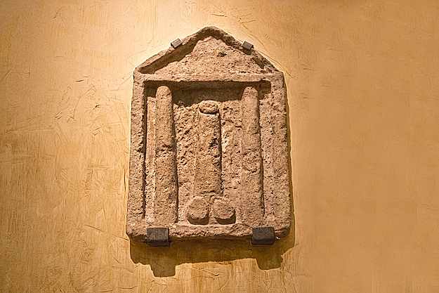 Reliefs of phallic symbols were often hung outside shops to ward off the evil eye or ensure prosperity