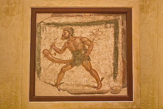 Fresco of Priapus, son of Aphrodite and god of fertility and growth, found in a villa in Pompeii