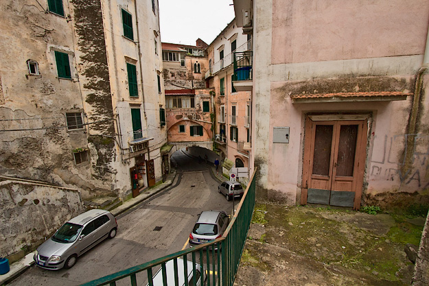 Narrow lane bracketed by ancient buildings in Amalfi