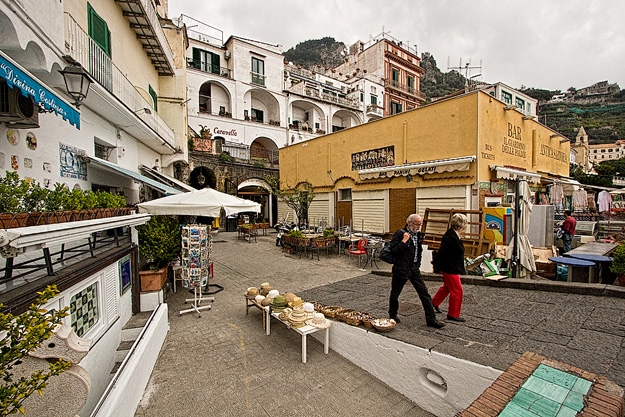 Shops line the seafront in Amalfi, Italy