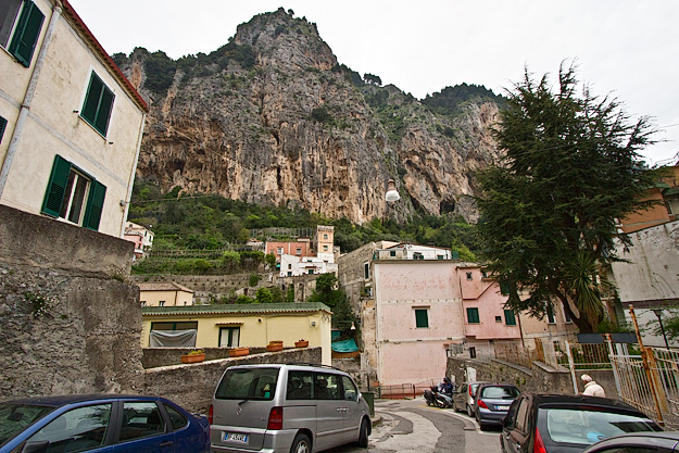 Pastel houses march up the mountains in Amalfi, Italy