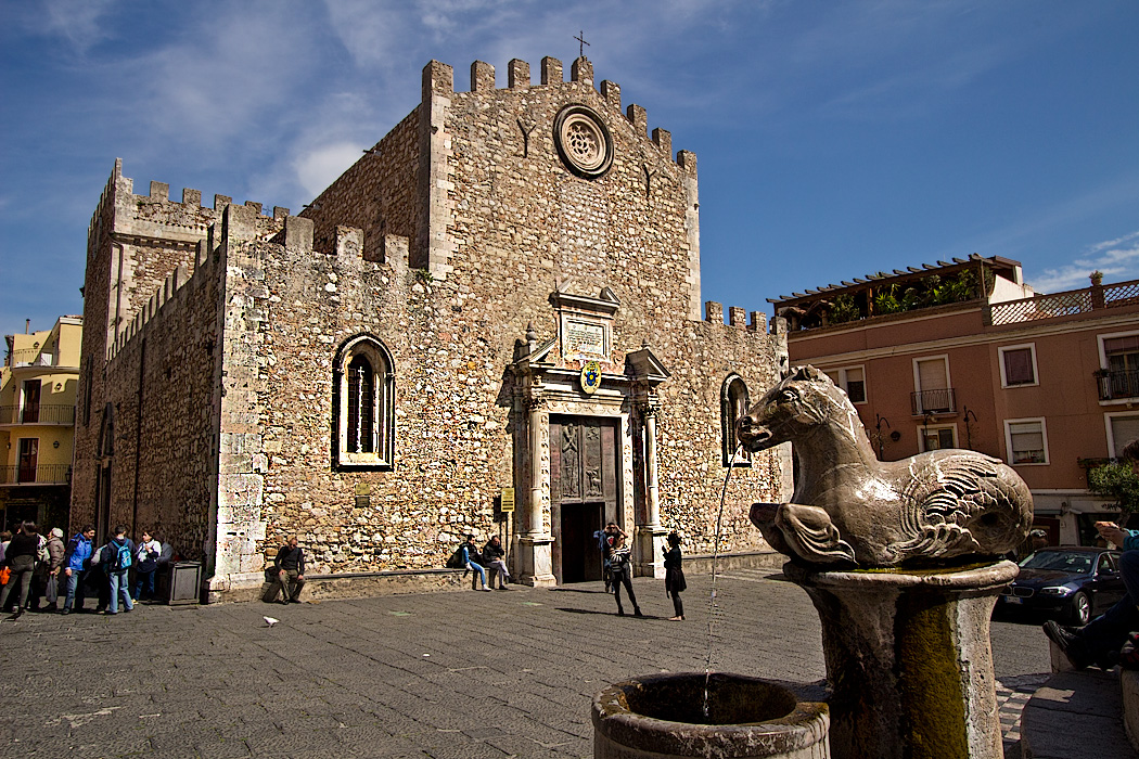 Basilica Cathedral and fountain in Piazza del Duomo in Taormina, Sicily, Italy