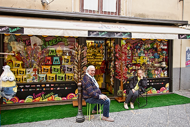 Owners relax in front of Lecce Candy Shop