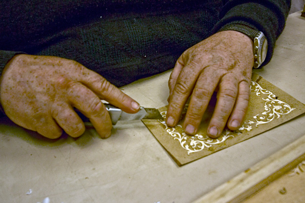 Cutting patterns for wooden boxes at La Scatola Joyelo woodworking shop