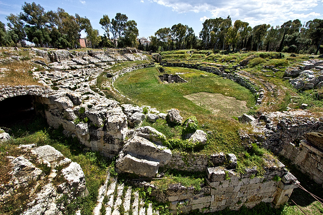 The Roman Amphitheater in Syracuse, Sicily, built in the 3rd-4th century A.D., was used for gladiator and animal fights.