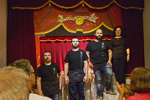 Mauceri family puppeteers take bows after a performance at Teatro dei Pupi in Syracuse, Sicily