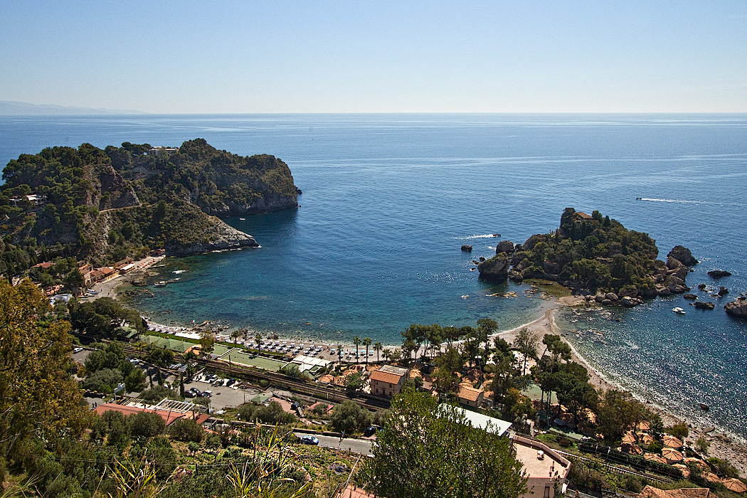 Beaches and cove at Isola Bella Bay, at the foot of the cliffs in Taormina, Italy
